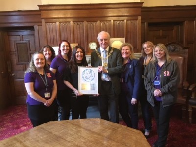 Receiving our reaccreditation award with the Lord mayor of Coventry.jpg